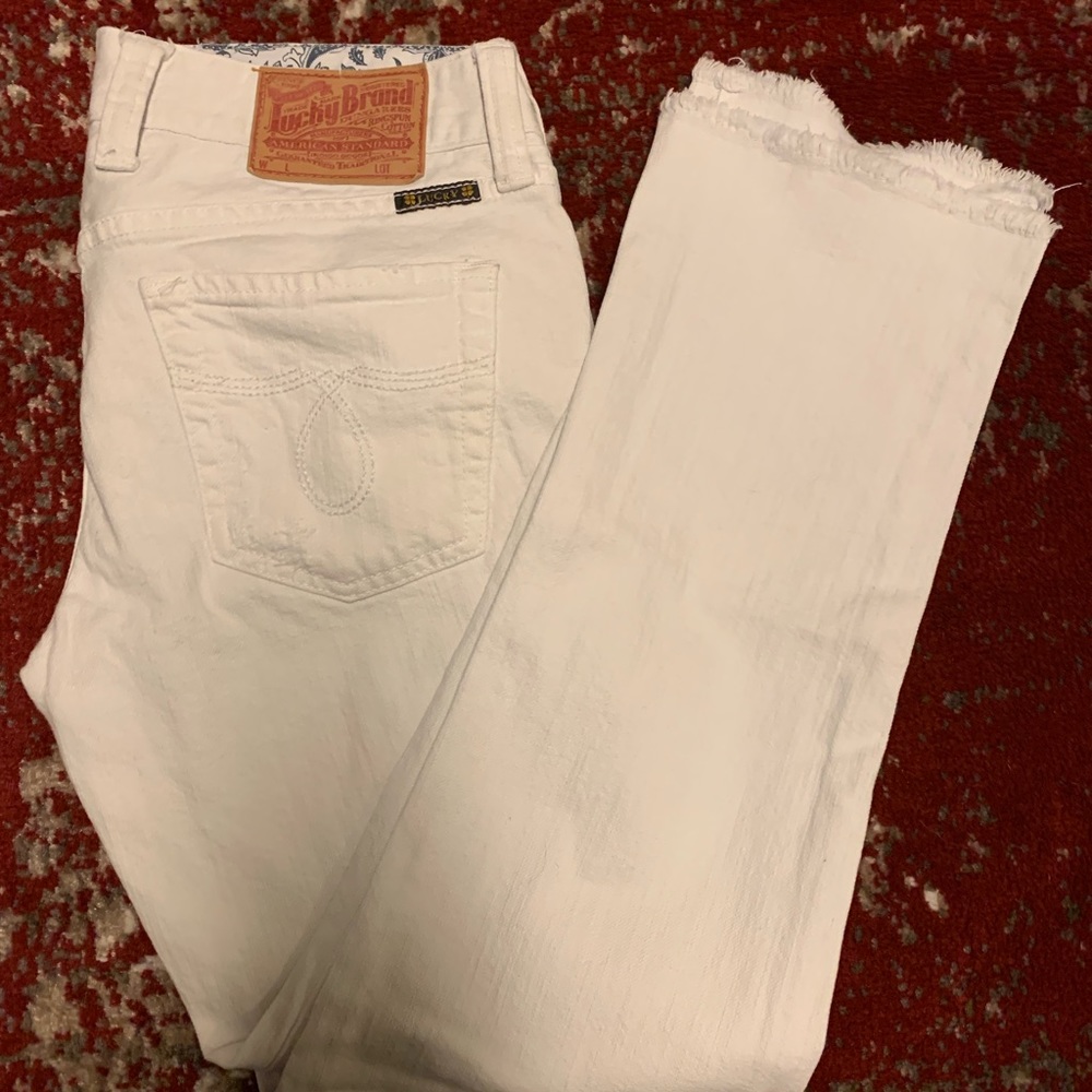 Lucky Brand white distressed crop pants.